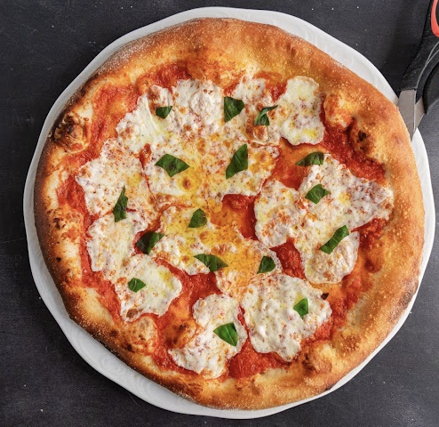 The Sicilian Butcher signature dishes Margherita PizzaFlora’s SaladMeatball with Sauce